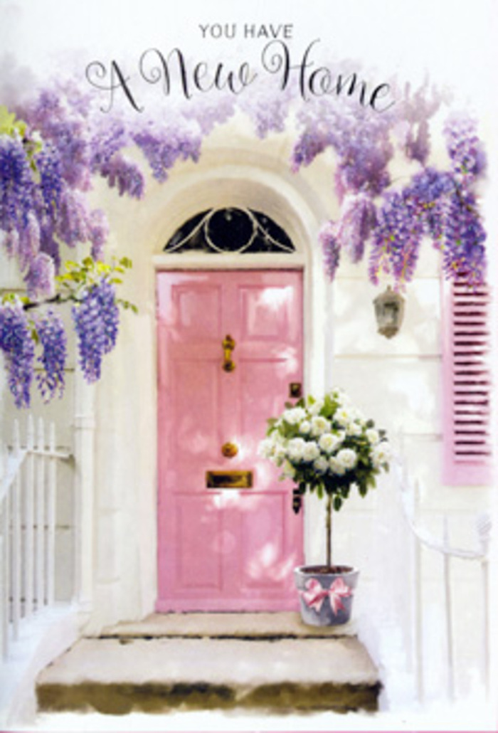 This image captures a doorway in Pentonville at that tender moment when a house starts to feel like a home, and the first flowers arrive to bless the threshold. A soft pink front door, neatly painted and gently luminous, stands at the centre, surrounded by whitewashed walls that catch and reflect elusive London light. One shutter, brushed in a matching pastel tone, leans open just enough to suggest fresh air drifting in from nearby Pentonville Road. Overhead, wisteria cascades in luxuriant streams of lavender and soft purple, its blossoms suspended like fragrant tassels, giving the entrance an almost storybook charm familiar to anyone who has wandered the residential streets not far from King's Cross. On the step, carefully placed as though by a thoughtful local florist, sits a grey tin bucket with a subtle vintage feel. From it spill lush white and cream roses, their layered petals plush and velvety, interspersed with soft green foliage that peeks out at different angles, adding movement and a sense of hand-crafted ease. A delicate pink ribbon encircles the bucket, tied into a relaxed bow whose satin sheen brings a gentle elegance to the rustic container. The shadows are calm and diffused, suggesting late afternoon, when deliveries are arriving and neighbours begin to return home. The atmosphere is one of quiet excitement and hope, ideal for celebrating a new set of keys, sending congratulations to someone moving closer to Angel or Islington, or simply marking a fresh chapter. It feels like a floral embrace at the doorstep, whispering, Welcome in, your new life is waiting inside.