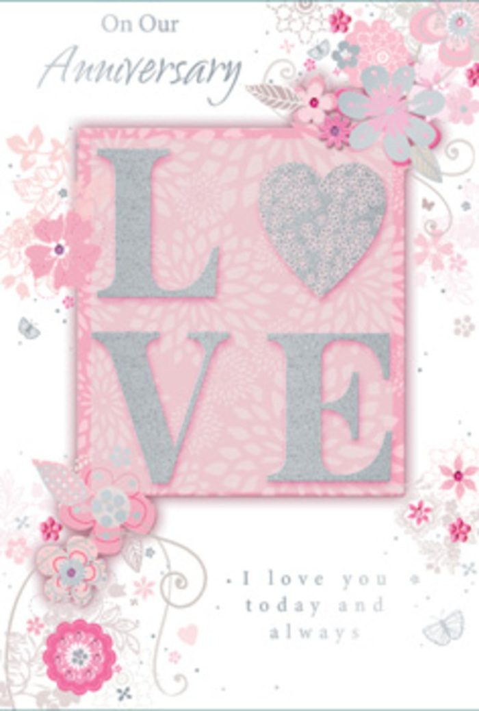 This close-up view of an anniversary card captures a scene that feels as tender and thoughtful as a hand-tied bouquet created for a quiet celebration at home in Pentonville. Dominating the centre is the word LOVE, presented in large, raised letters that seem almost sculpted from soft blush pink and pearly white, their edges lightly kissed with glitter that sparkles in subtle silvery tones. The surface of the letters appears textured and slightly frosted, inviting the fingertips to rest and explore, much like running a hand along velvet petals or satiny rose buds. Behind and around this central word, the soft pink background deepens near the middle and fades outward, giving a gentle sense of depth, as if the lettering is emerging from a cloud of colour. Encircling the word are stylised floral motifs: fine-lined blossoms, unfurling buds, and slender leaves scroll gracefully across the card, their curves reminiscent of stems arranged in a loose, romantic bouquet by a local florist preparing deliveries for homes off Caledonian Road or around nearby King's Cross. The flowers themselves are illustrated in muted shades of blush, dove grey, and creamy white, with a few details touched in silver to mimic the glint of morning dew or the sheen of foil. These flowing ornaments create a rhythm that leads the eye from one side of the card to the other without ever distracting from the central sentiment. Complementing the artwork, a message of enduring love and gratitude is set in a refined, cursive script below and around the floral swirls, its tone intimate yet timeless. Overall, the card feels like a quiet, heartfelt tribute to a relationship that has matured over the years, perfectly suited to an anniversary evening in one of Pentonville's calm side streets.